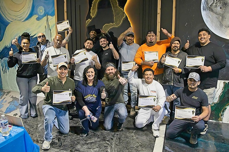 Certified graduates of a recent class